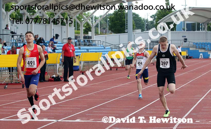 491 Joseph Reid (Manx Harriers) wins from 397 Lee Thompson (Rotherham) 2nd and George Wilson (Gateshead) 3rd in the under-20 400 metres, Northern Senior and Under-20 Champs., Sport City, Manchester. Photo: David T. Hewitson/Sports for All Pics